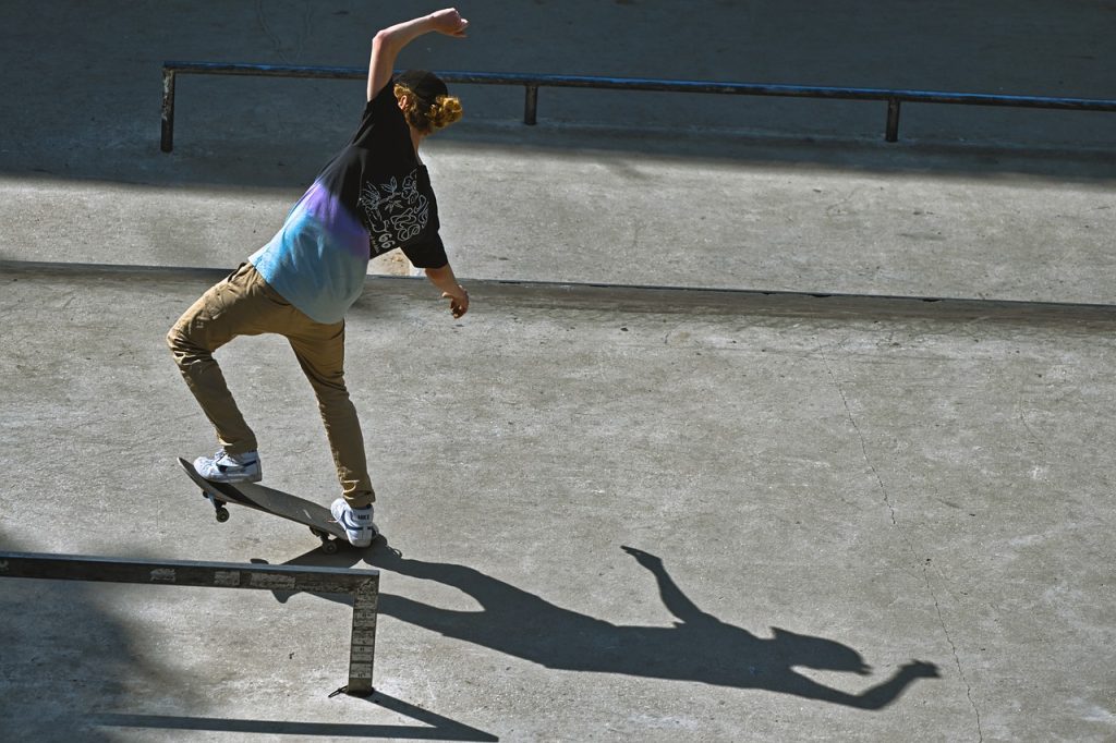 how-to-maintain-a-concrete-driveway. Man skateboarding on concrete