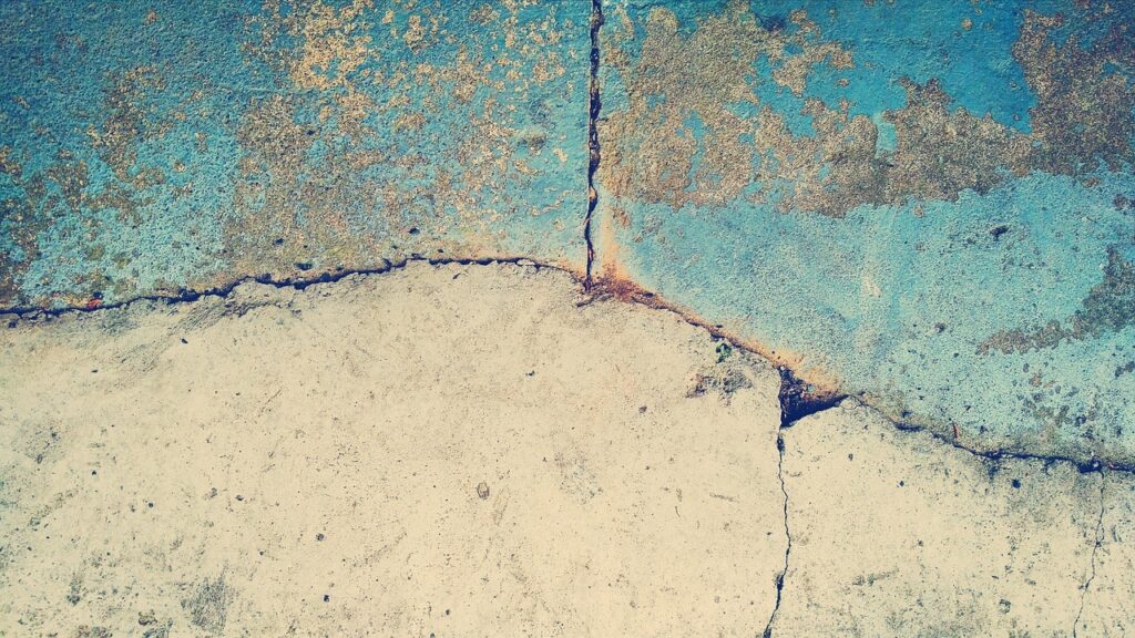 sidewalk needing concrete patching GTA