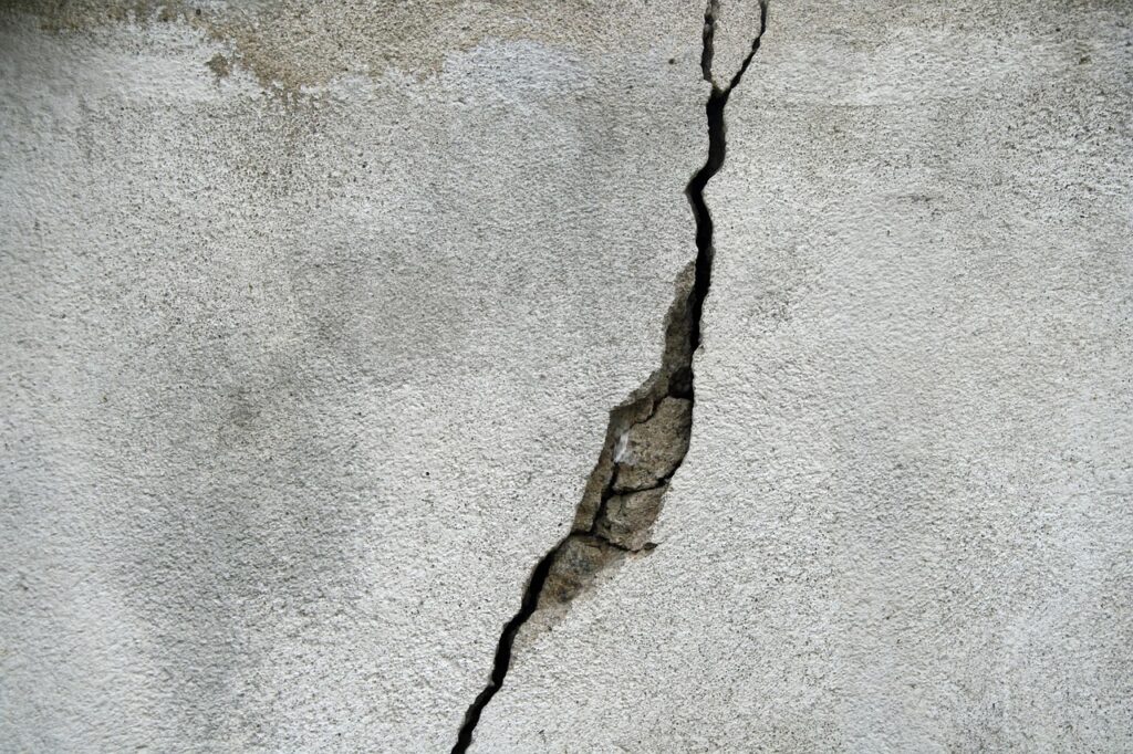 pavement in need of driveway concrete repair