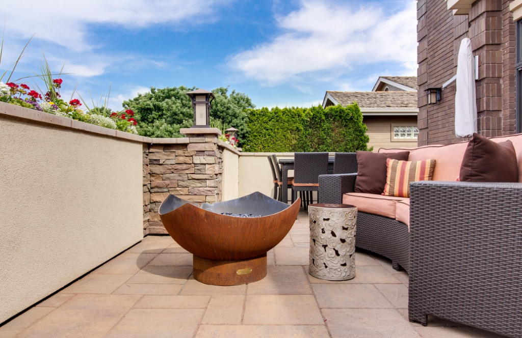 outdoor patio during the day with rounded chair