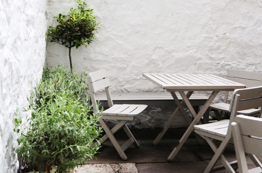 table, chairs in patio